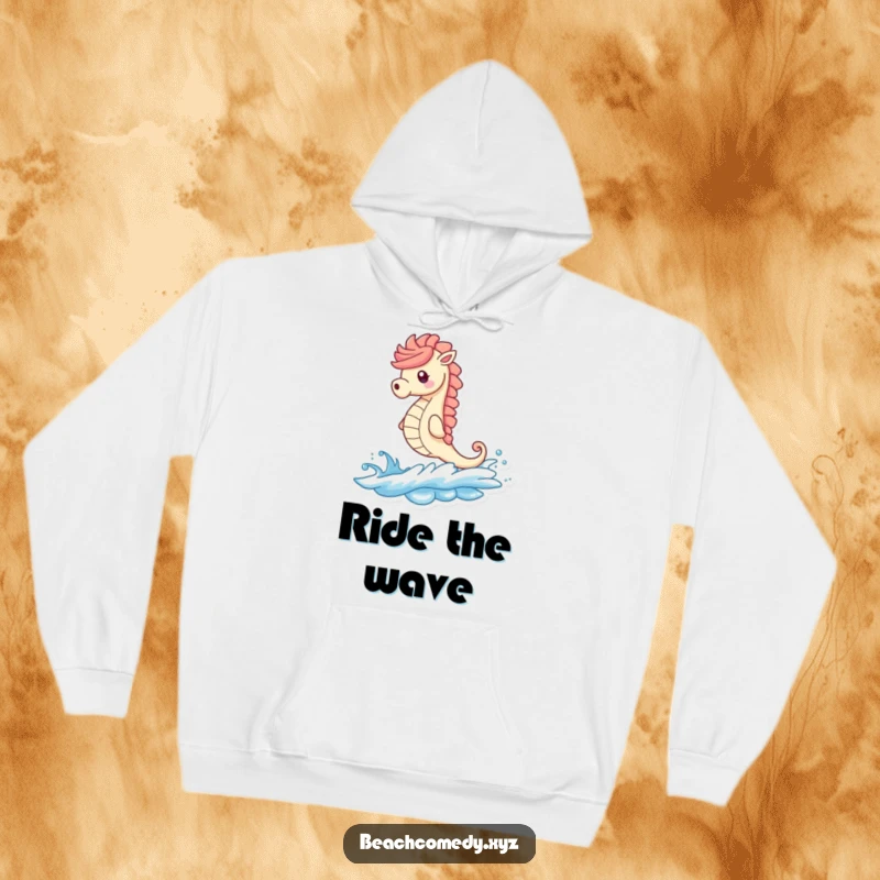 Funny seahorse riding a dynamic wave towards a sandy beach, featured on a comfortable hoodie, bringing beachy humor.