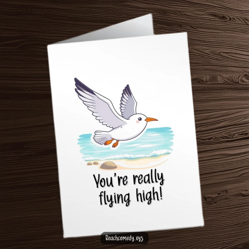 Smiling Free Printable Congratulations Card: A seagull gracefully soars above a tranquil beach, marking a peaceful success.